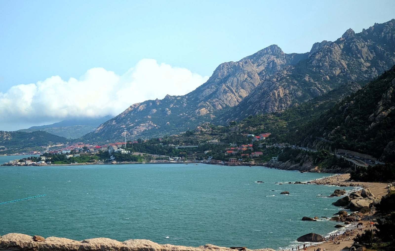 Rocky coastal mountains along the route of the Jinma Technology team retreat